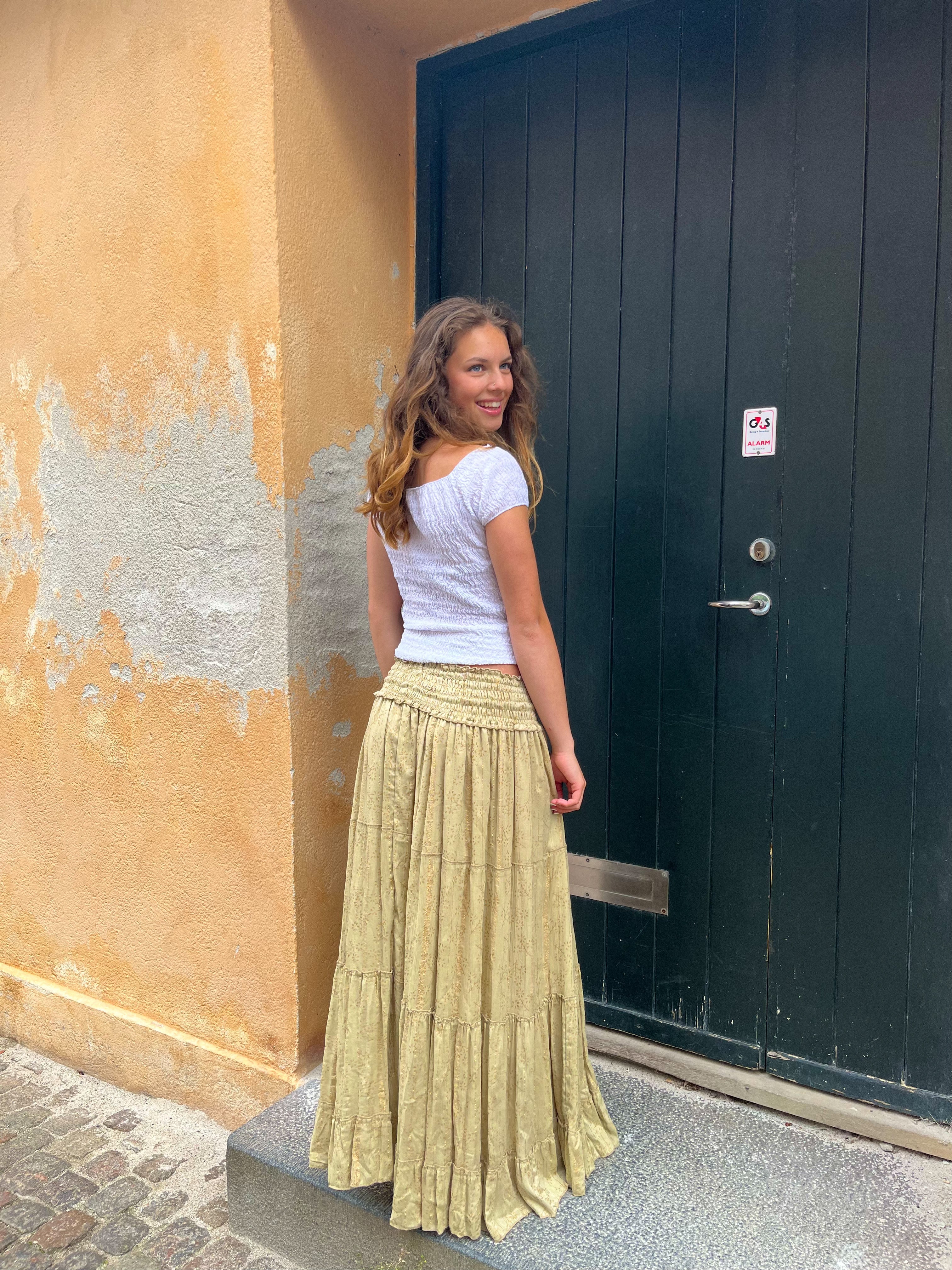 green skirt and yellow top